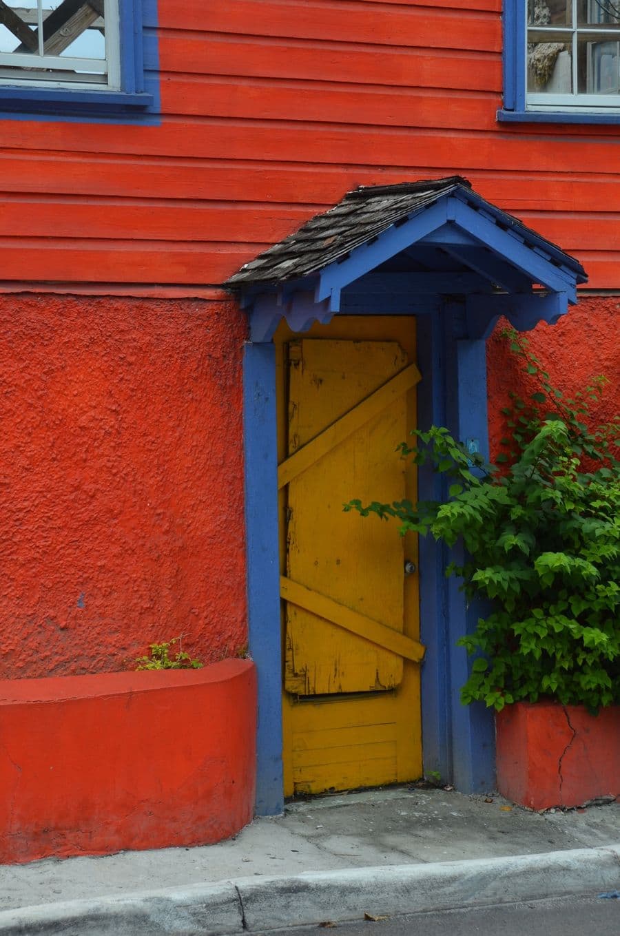 Yellow panelled door in a colonial wall, Nassau